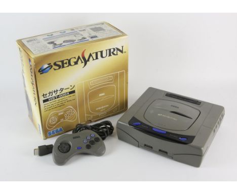 Sega Saturn console [Version 1] (NTSC-J) This is the grey version of the console, complete and boxed with 1 controller Condit