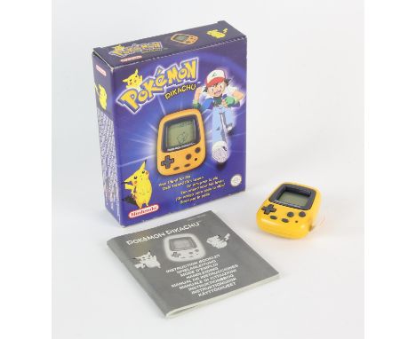 Boxed Pokémon Pikachu Pocket Handheld Console from 1998 Condition Report:  Item is complete, boxed and with all of its origin