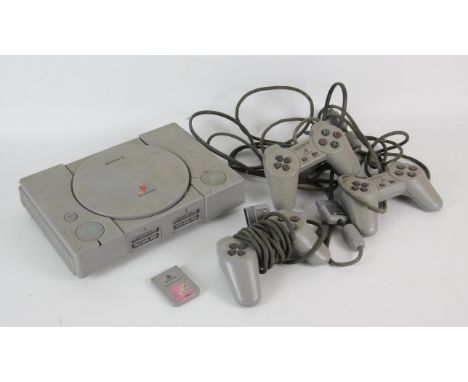 Playstation One. PS1 Console & Controllers (x2) (PAL) Condition Report:  Complete, unboxed and in used condition.