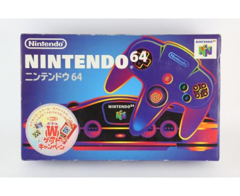Japanese Nintendo 64 Console with grey Controller (NTSC-J) N64 Condition Report:  Console is complete and boxed with a faded 