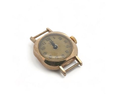A 9ct gold ladies Tudor watch head with hallmarks to inner case and numbered 384016. It is the buyer's responsibility to ensu