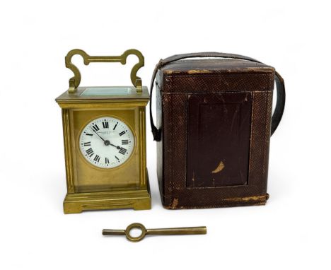 Stewart Dawson &amp; Co late 19th / early 20th Century brass carriage clock with key in leather carry case. At the time of wr