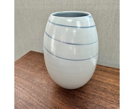 Joanna Constantinidis (British, 1927-2000), white and blue porcelain lustre ovoid vase, integral blue spiral decoration. Impr