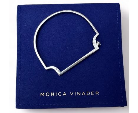 A Monica Vinader 'Signature Skinny' silver bangle. With box and pouch. Bracelet length 5.4cm, width 6.2cm, depth 1.8mm. Pleas