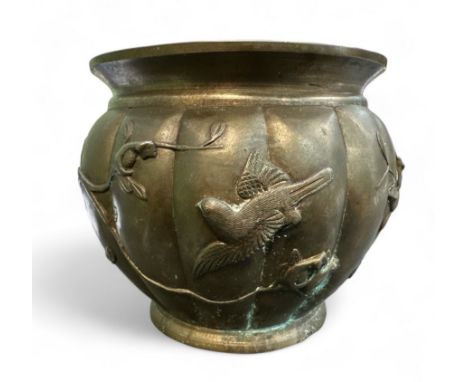 A Japanese bronze jardiniere / planter with bird design. Diameter of top 21cm.