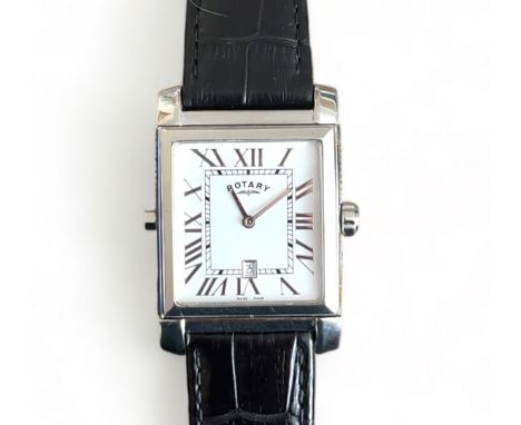 A gents quartz Rotary Relevation reverso dual face watch with a black dial on one side and a white dial on the other. Black l