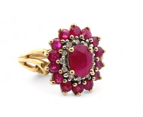 A ruby and diamond 9ct gold cluster ring, size J. Weight 3.74g. Please see the buyer's terms and conditions for purchasing di
