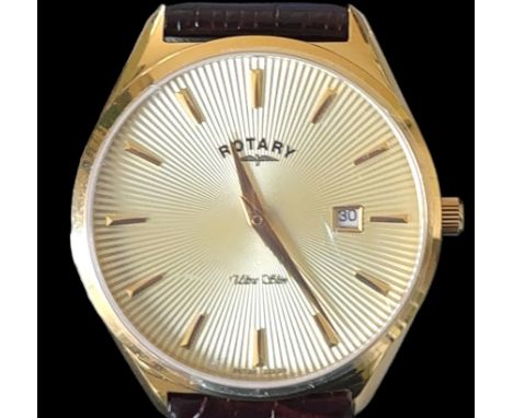 A boxed Rotary Ultra Slim gold plated watch, GS08013/03 (16550) in unused condition. Golden dial with textured pattern, date 