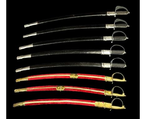 Collection Of Eight Indian Calvary Swords. Three in Red velvet wrapped wooden sheaths. Five in Black canvas sheaths. All blad
