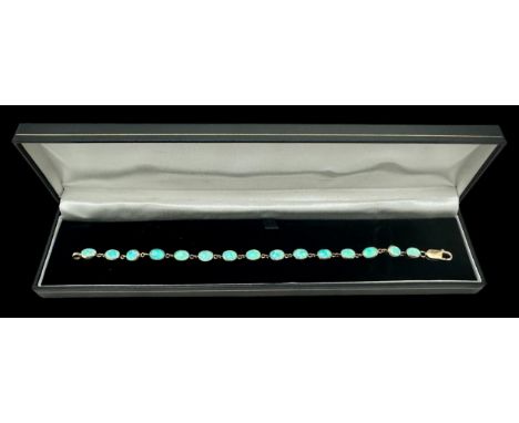 Blue opal line bracelet stamped 9ct. Length approx 19cm. Weight 9.9g. Please see the buyer's terms and conditions for purchas
