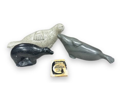 Inuit soapstone carvings, to include; two seals one by Alice Mikiyuk (b.1926), and a polar bear by Timothy Qiatalla Assapa (1