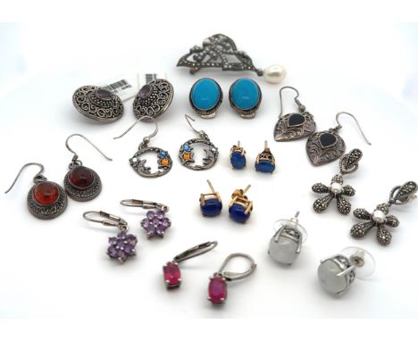 Eleven pairs of gem set earrings, including ruby, amethyst, moonstone, amber etc, all stamped as 925 or silver. Also a 925 ma