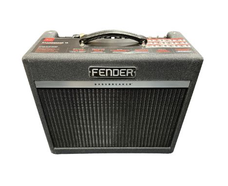 Fender Bassbreaker 15 Watt Amplifier. An all-tube Fender guitar amplifier. In great cosmetic condition with leather carry han