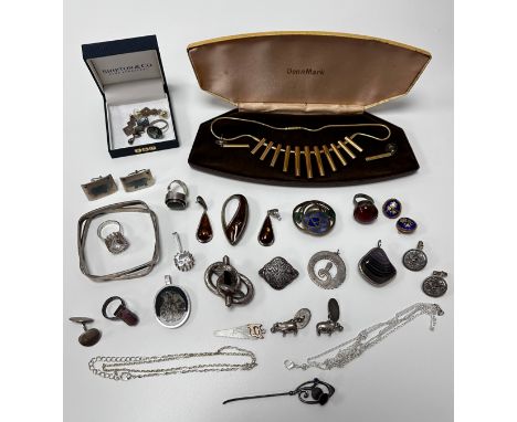 Collection of silver, white metal and costume jewellery. including an amber pendant and earring set, an abalone shell ring an