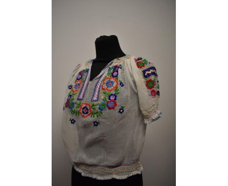 A 1930s embroidered peasant blouse.