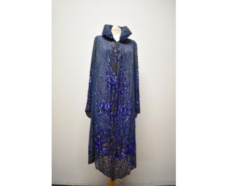 A magnificent royal blue 1920s coat or cover up, having extraordinary intricate gold and silver beading and iridescent purple