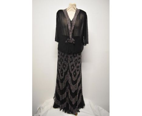 A superb 1930s Art Deco two piece outfit; comprising skirt and blouse, both skirt and blouse having the most amazing multi co