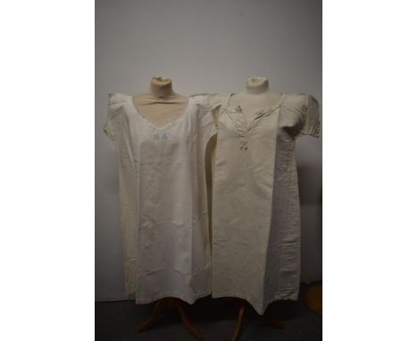 An antique shift having monogrammed initials 'M R' and a smock of heavier weight fabric, possibly artists or similar, with in