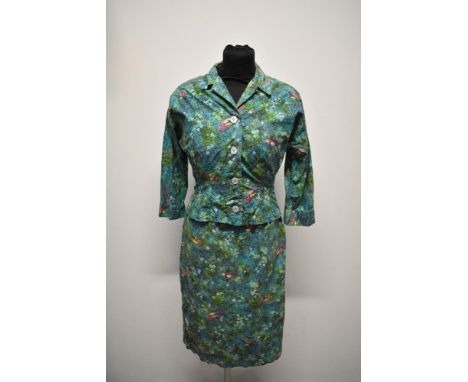 A 1950s novelty exotic bird print cotton two piece dress suit by Wetherall, having wiggle dress with wrap over bust and rear 