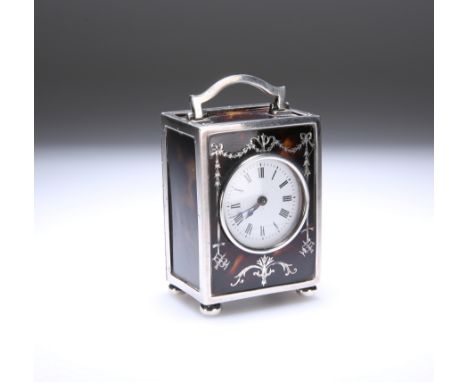 A GEORGE V SILVER AND PIQUE WORK MINIATURE CARRIAGE CLOCK, the silver hallmarked for William Comyns &amp; Sons Ltd, London 19