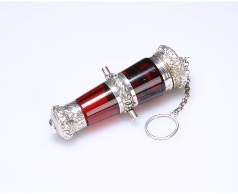 A FINE VICTORIAN SILVER (TESTED) MOUNTED RUBY GLASS CANNON-SHAPED SCENT BOTTLE/VINAIGRETTE, the hinged cover opening to revea