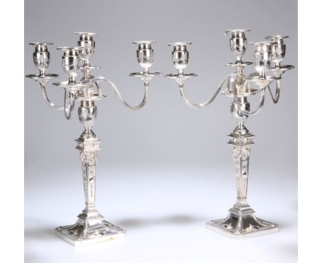 A HANDSOME PAIR OF VICTORIAN FOUR-LIGHT SILVER CANDELABRA IN THE ADAM REVIVAL TASTE, Hawksworth Eyre &amp; Co. Ltd, London 18