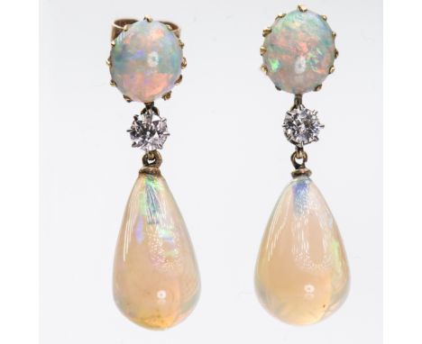 A PAIR OF 19TH CENTURY OPAL AND DIAMOND EARRINGS, the large tapering opal drop set beneath a single brilliant cut diamond and