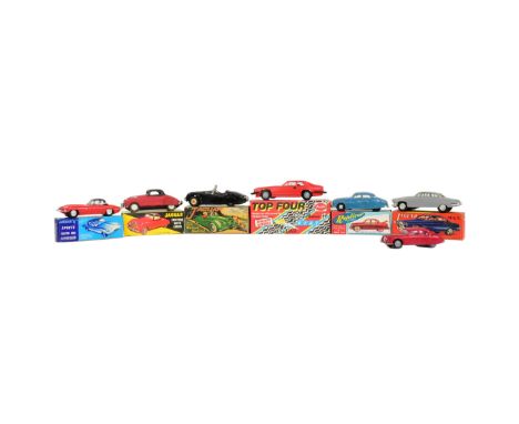 A collection of x7 Empire Made / Honk Kong tinplate and plastic friction motor model cars. All models being Jaguar variations