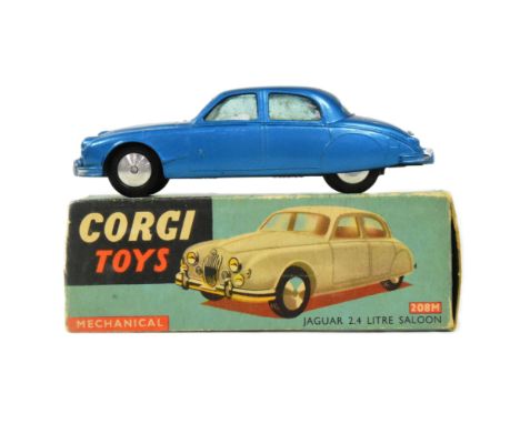 Diecast - an original Corgi Toys boxed diecast model No. 208M mechanical Jaguar 2.4 Litre Saloon. The model appearing VG+ / E