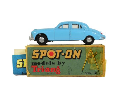 Diecast - an original vintage Triang Spot On diecast model Jaguar 3.4. The model with original box (lacking one flap) and and