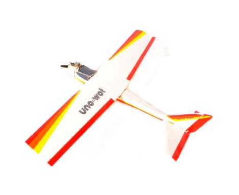 Radio Controlled Plane - a vintage model RC plane fuselage and wings. Wooden construction, fitted with engine and propellers.