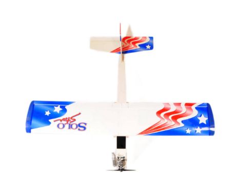 Radio Controlled Plane - a vintage model RC plane fuselage and wings. Fitted with front engine, propellers and radio gear. Wi