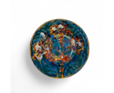 Quentin Bell (British, 1910 - 1986) for Fulham Pottery, a painted dish, with abstract floral decoration on a blue ground  21.