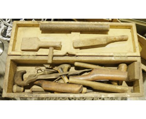Assorted vintage tools in wooden chest to include copper dressing tools, two vintage coopers bung hole boring awls, a hand sa