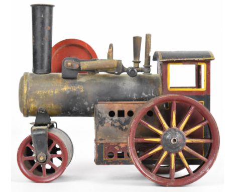 Likely Bing German made live steam roller in maroon, yellow and black with flywheel and burner, length 16cm.