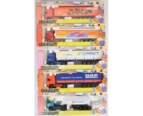 Five Joal Compact 1:50 scale diecast model haulage vehicles to include Volvo FH12-420 with cement tank and DAF 95 XF with cov