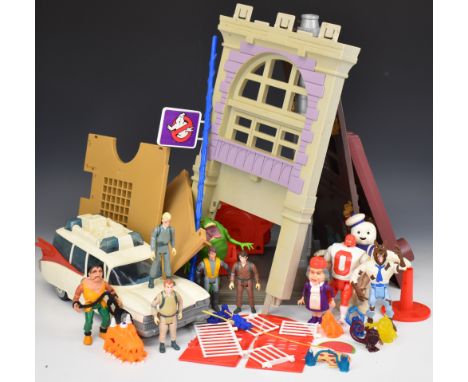 A collection of The Real Ghostbusters figures and playsets by Kenner to include Fire Station, Ecto-1, Slimer, Stay Puft Marsh