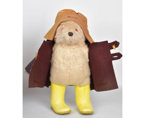 Paddington Bear Teddy with orange felt hat, brown coat and yellow Dunlop Wellington boots together with two Merrythought soft