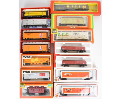 A collection of 00 and H0 gauge model railway rolling stock to include Hornby, Bachmann and continental.