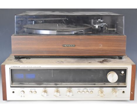 Pioneer stereo receiver model SX-535, and a Pioneer turntable / record player model PL-120