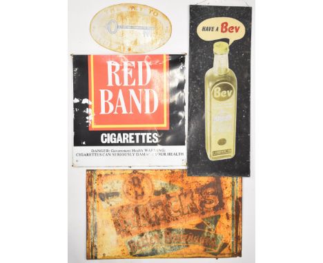 Four vintage and retro printed tin advertising signs comprising J Lyons Bev, Red Band cigarettes, Ulverston Chamber of Trade 