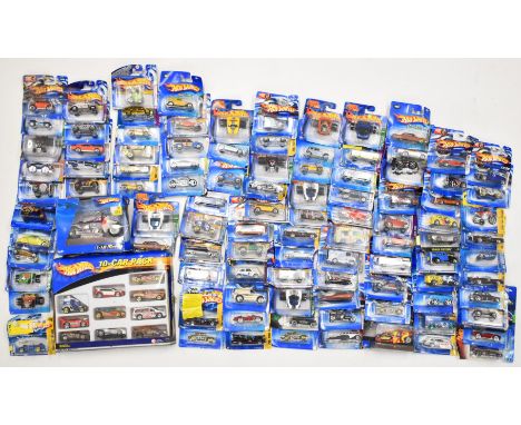 Over one hundred Mattel Hot Wheels diecast model cars dating mostly to the early 2000's to include a 10 car boxed set, all on