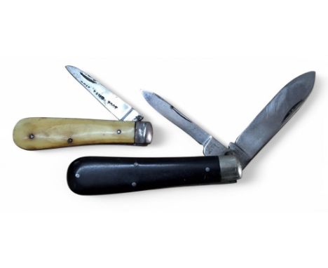 A Harrison Brothers and Howson two blade pocket knife, the smaller blade's ricasso stamped Cutlers to his Majesty,ebony scale