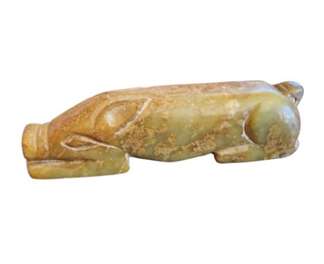 A Chinese Archaic stone carving, of a stylised pig, 10cm long