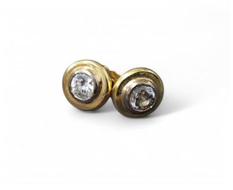 A pair of 18ct gold and diamond stud earrings, each earring set with a round brilliant cut diamond, total diamond weight appr
