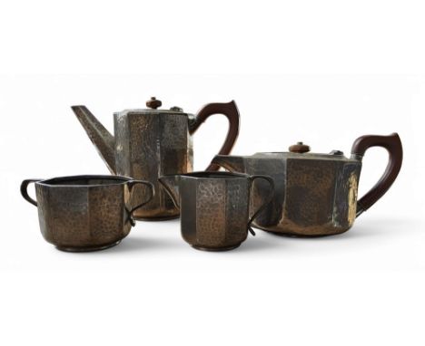 A Tudric pewter four-piece panelled octagonal tea service, hammered, bakelite handles, 15cm high, marked Tudric 01650