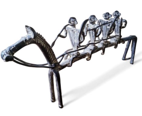 African tribal art - a Benin bronze, warriors on horseback, 40cm long x 19cm high