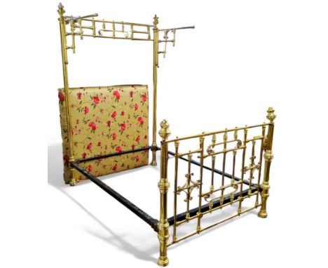 A Victorian brass half tester double bedstead, upholstered back panel, in silk with peonies and butterflies, gold ground, 122