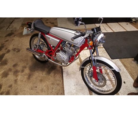 Honda 50 AC15 “Dream” Race replica with ultra low miles - Do you ride it or put it on the wall, it is after all as pretty as 