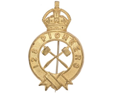 Indian Army. 128th Pioneers pagri badge circa 1903-22.  Good British made die-stamped white metal crowned circular title scro